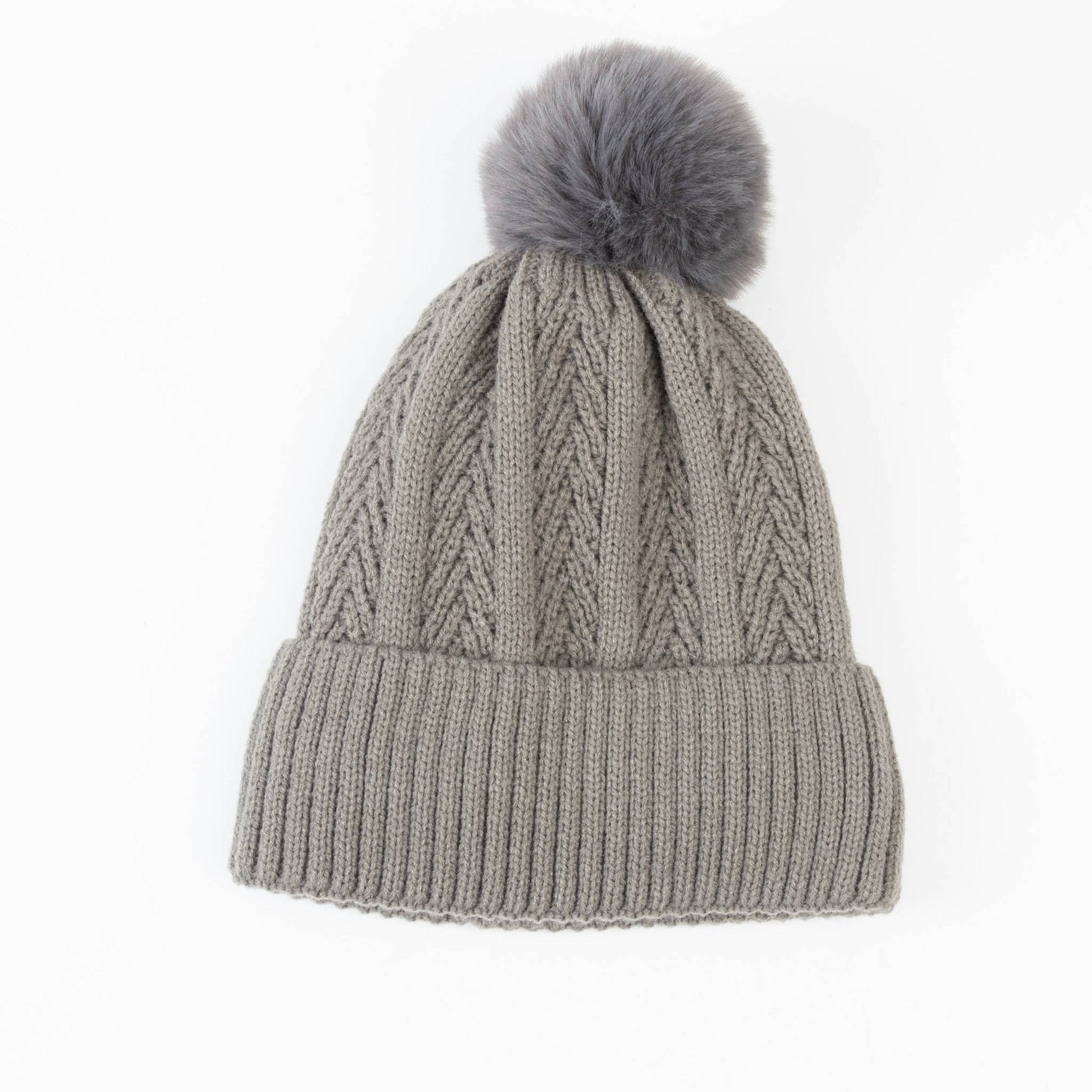 Howard's Roxanne knit beanie hat with pom lining, featuring a cozy, stylish winter knit hat perfect for cold weather.
