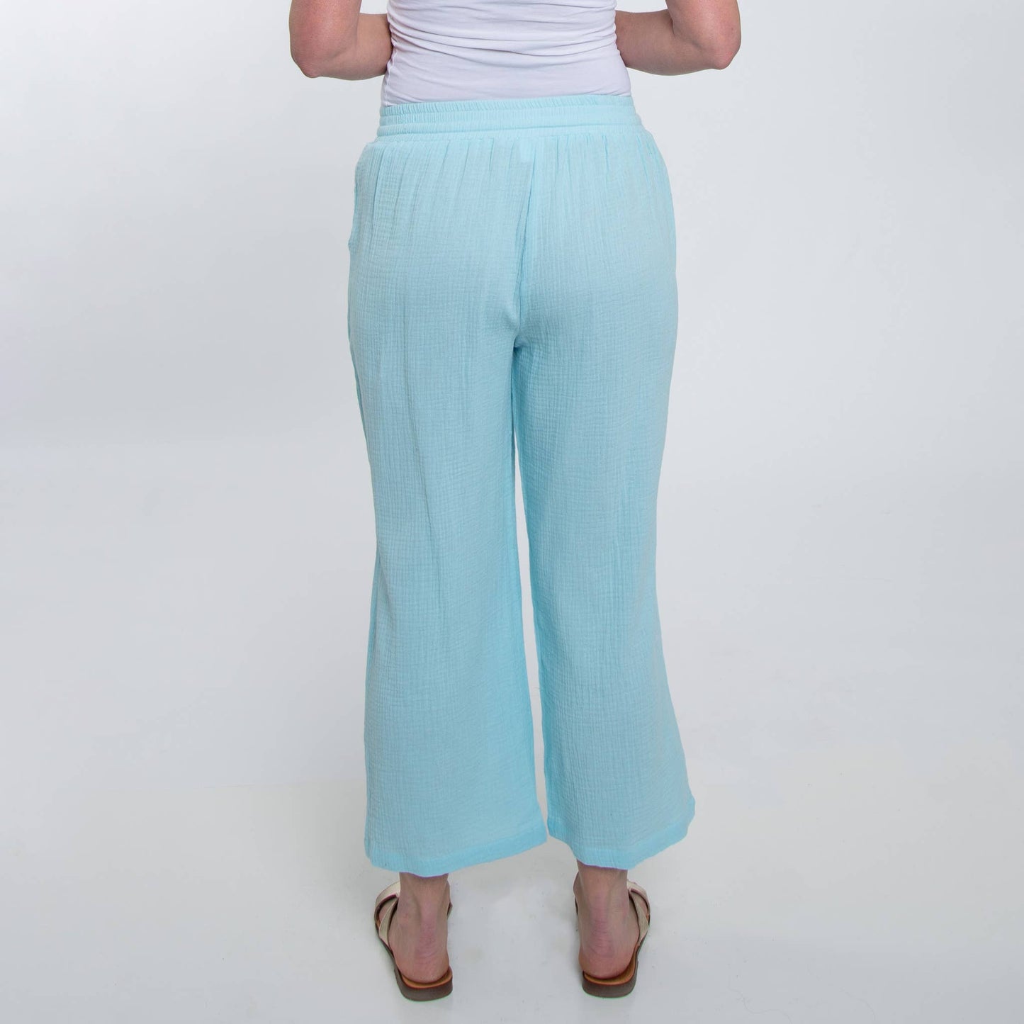 Howard's cotton cropped pants displayed on a model, showcasing a relaxed fit and casual style perfect for everyday wear.