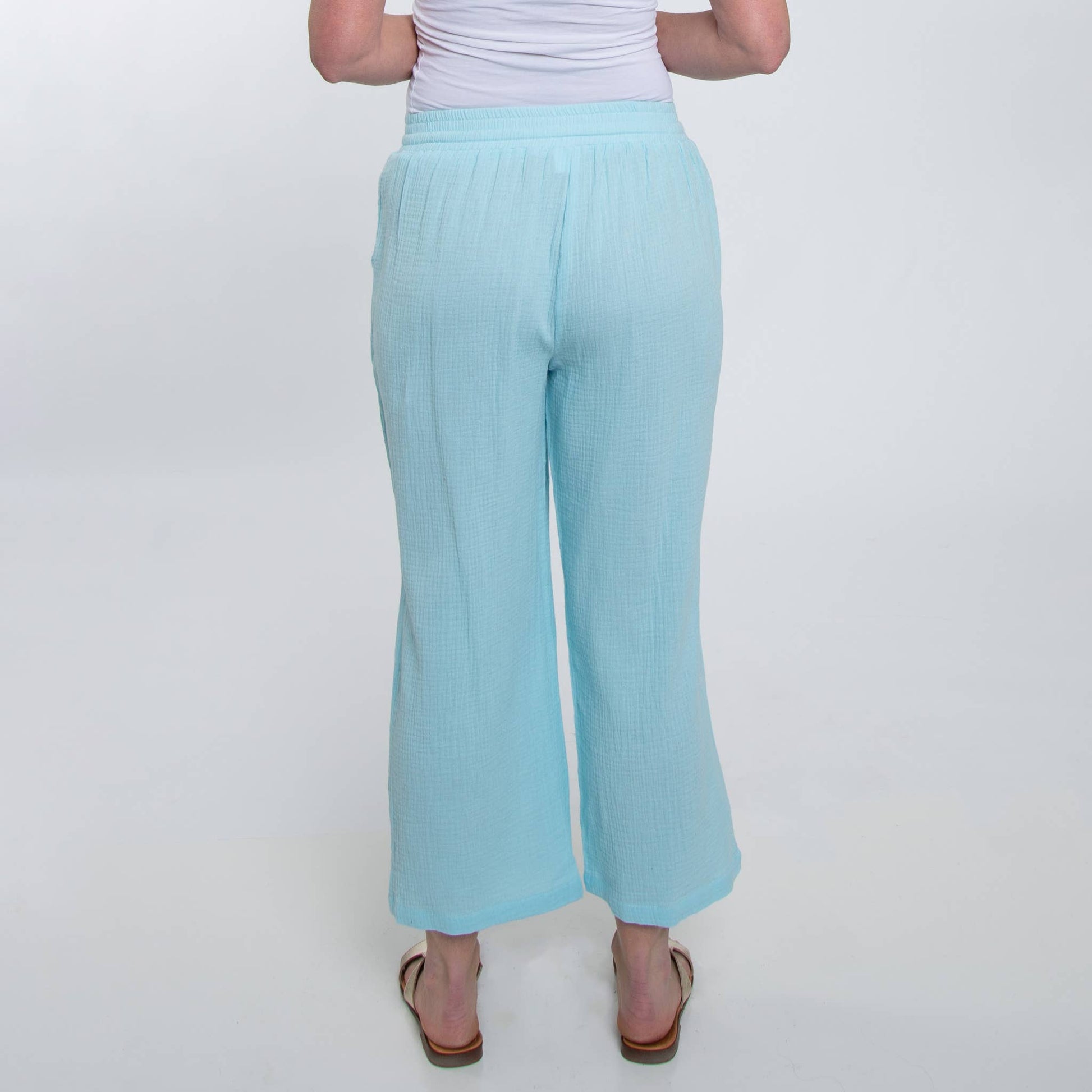 Howard's cotton cropped pants displayed on a model, showcasing a relaxed fit and casual style perfect for everyday wear.