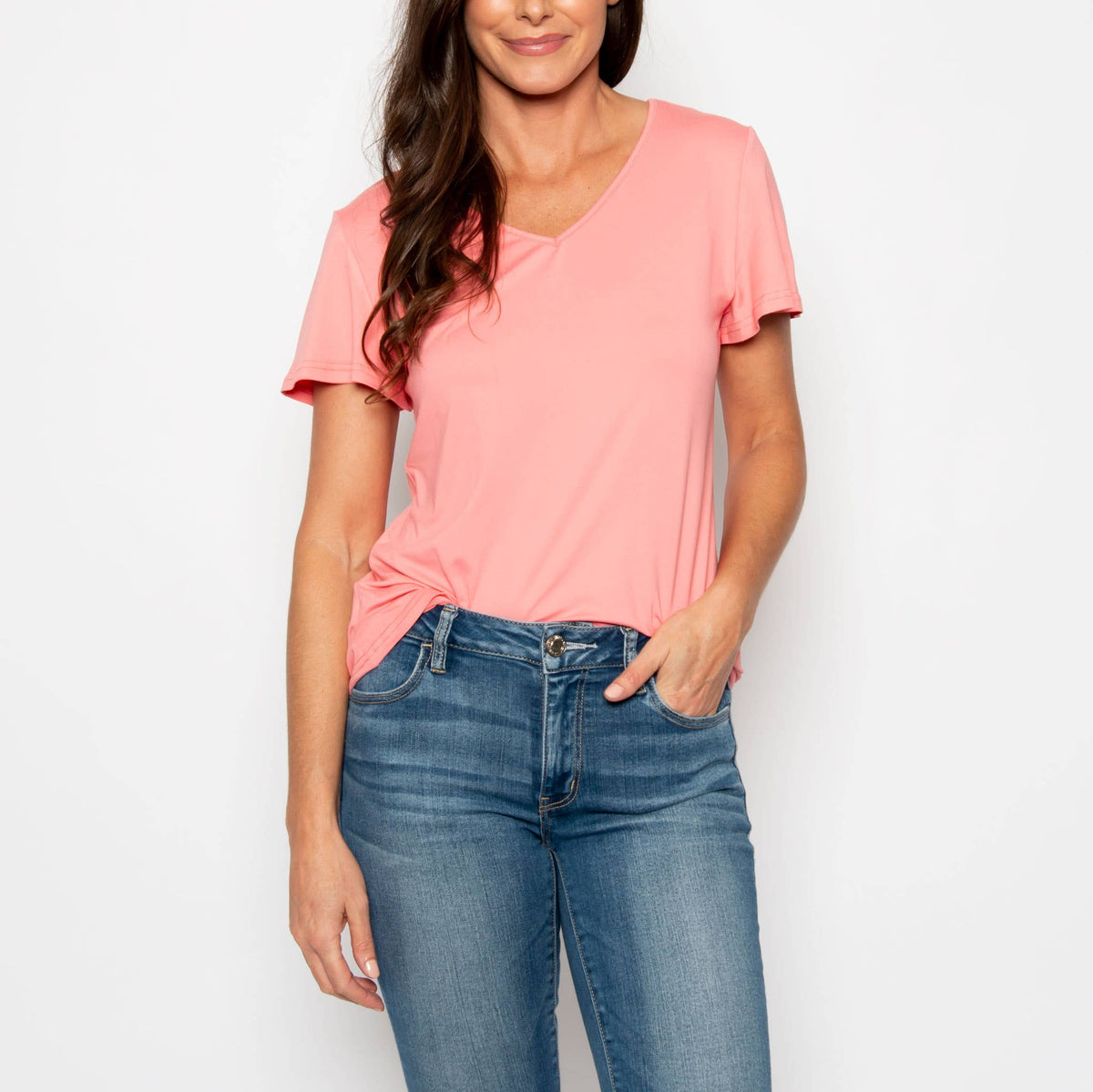 Howard's Giselle short sleeve V-neck top displayed on a hanger, featuring a fitted style and soft fabric in a neutral color.