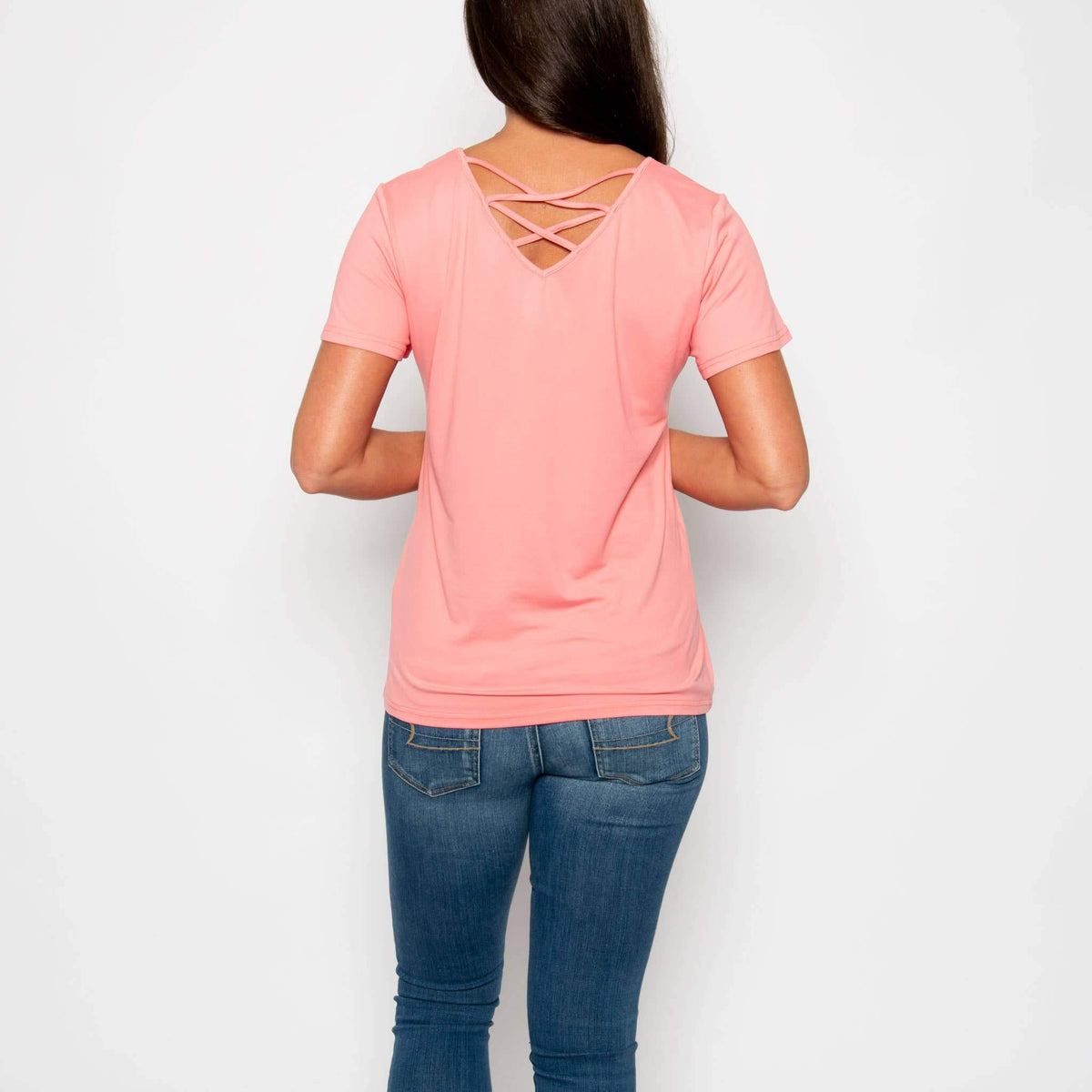 Howard's Giselle short sleeve V-neck top shown in a stylish, fitted design with a smooth fabric finish.
