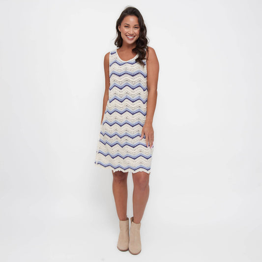 Howard's sleeveless crochet dress featuring intricate open-knit design and a flattering fit, perfect for summer or casual wear.