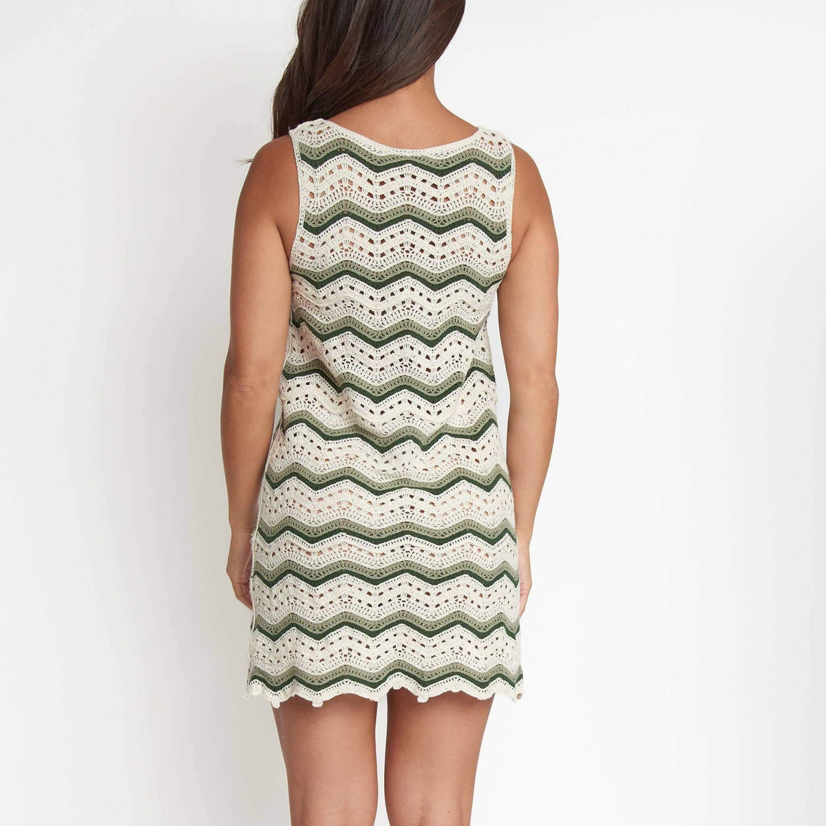 Howard's sleeveless crochet dress with intricate open-knit design, perfect for summer or casual wear.