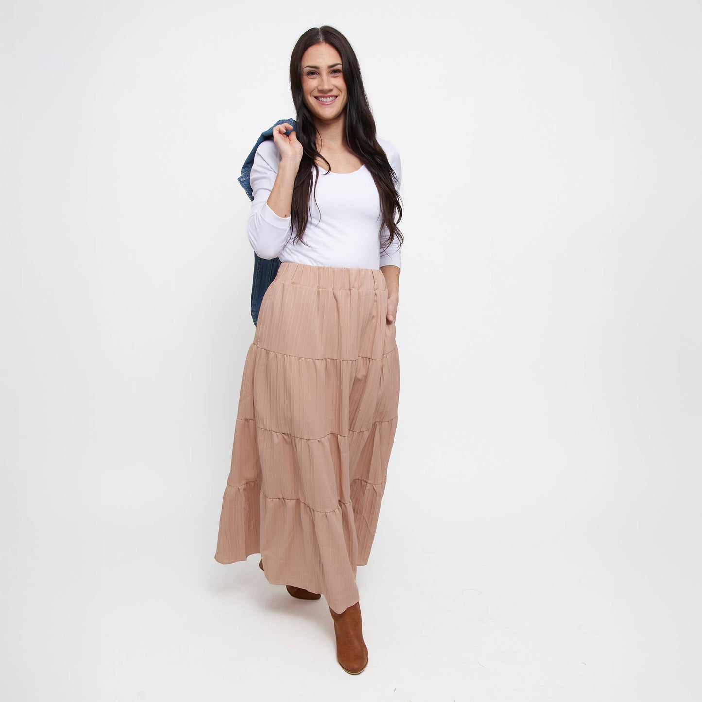 Howard's McKay tiered rosewater maxi skirt with pockets, featuring a flowy design and floral-inspired layers.