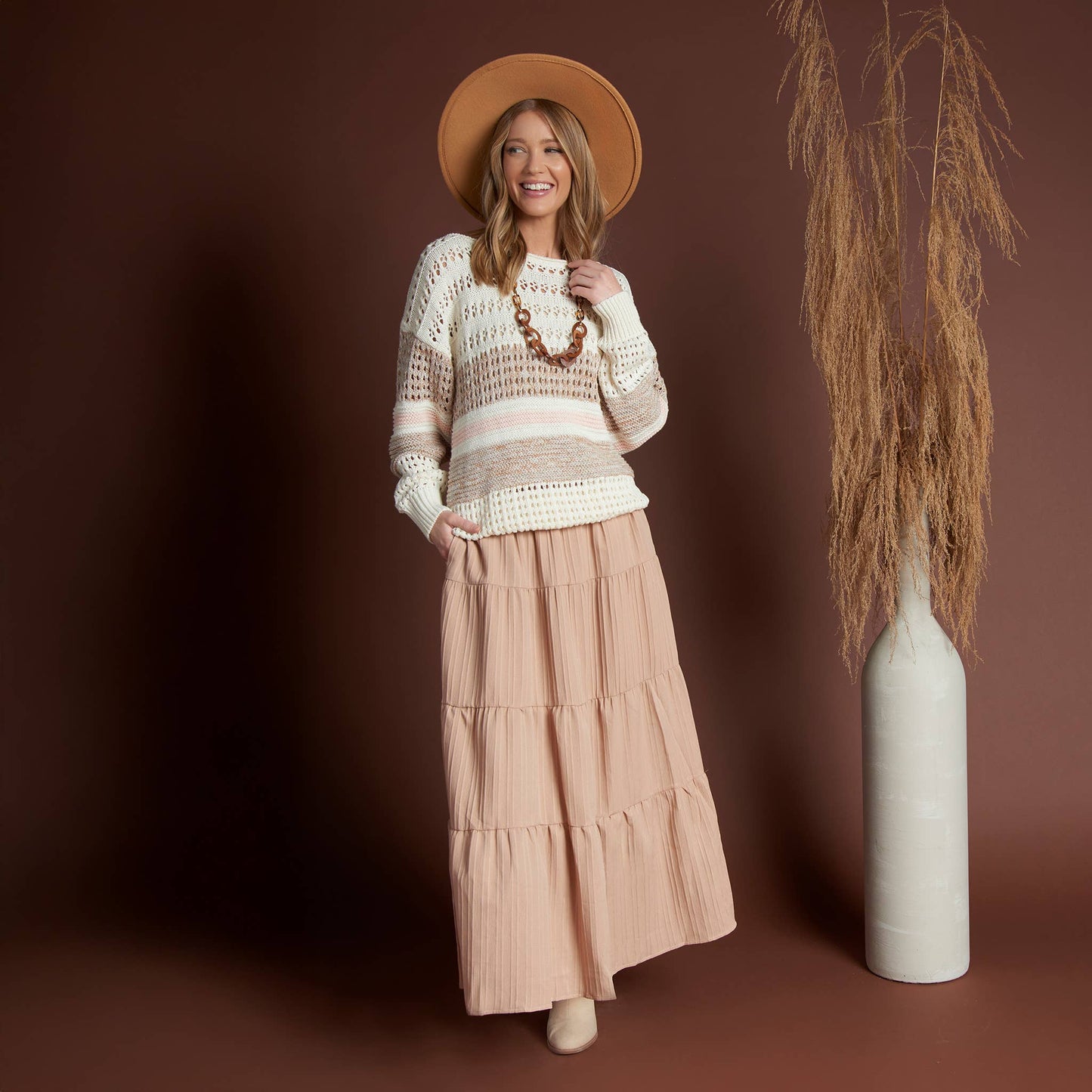 Howard's McKay tiered rosewater maxi skirt with pockets, flowing fabric, and a layered design perfect for casual or dressy wear.