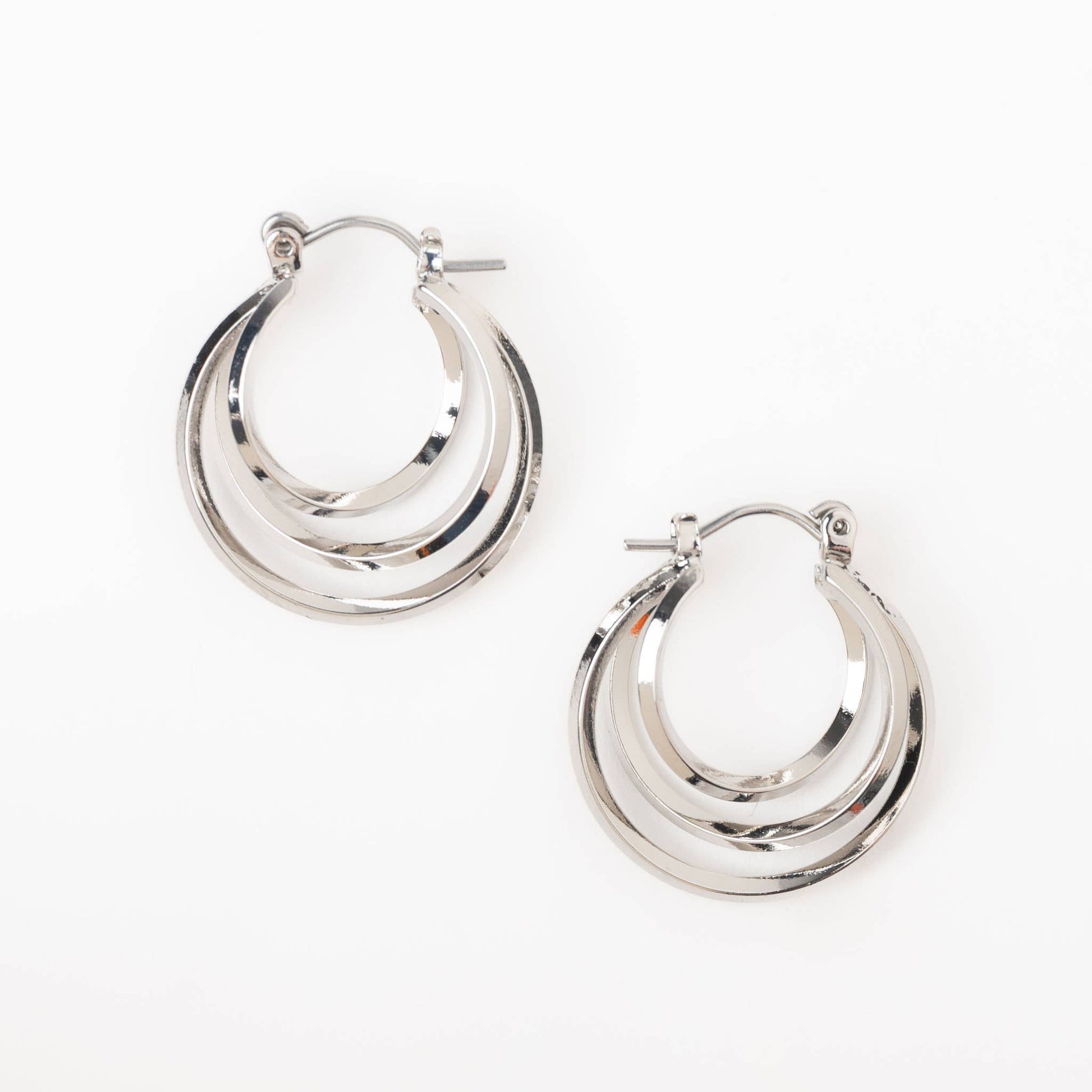 Nickel-free Howard's classic hoop earrings showing smooth, shiny silver hoops with a secure clasp on a white background.