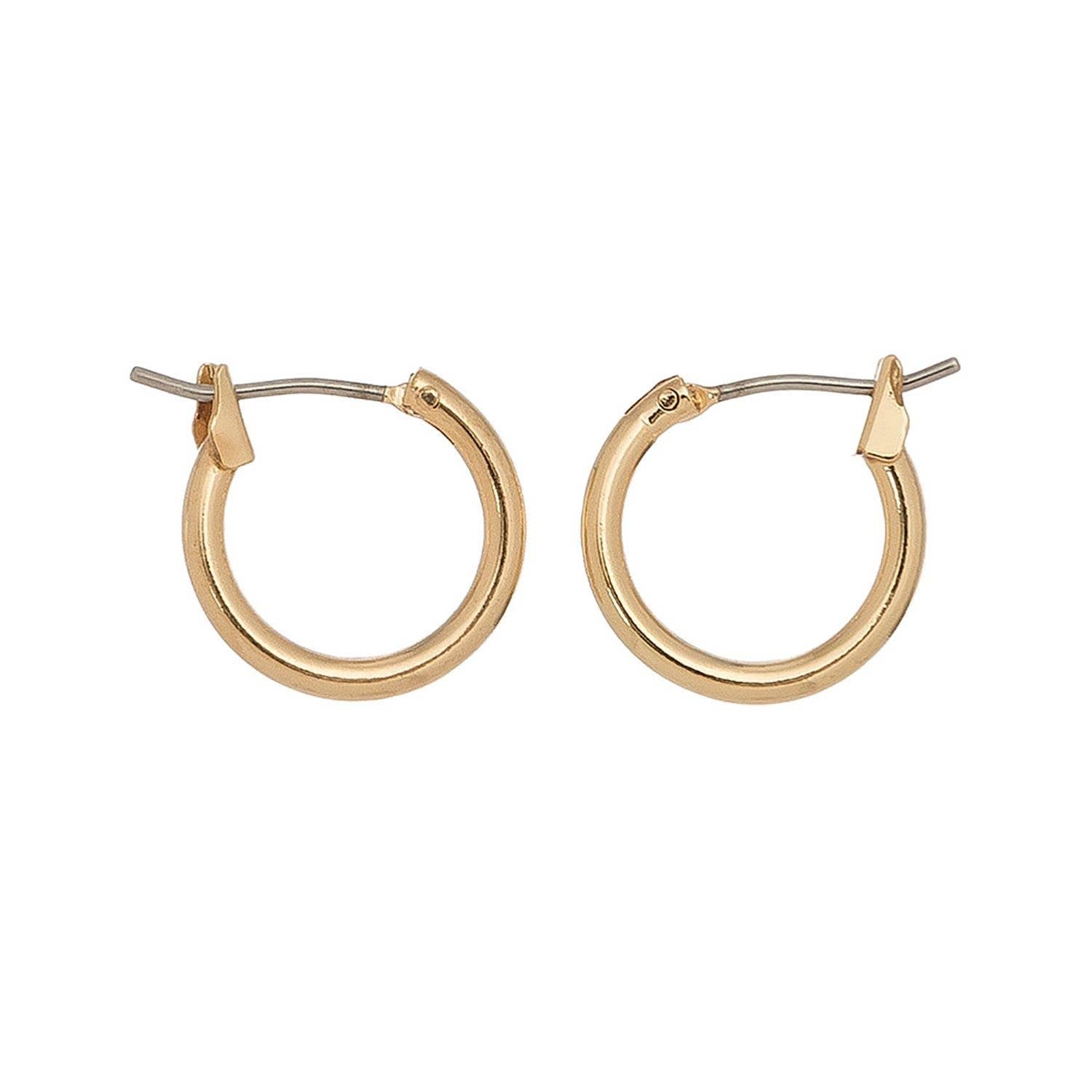 Howard's Ear Sense Click Hoop Earrings, gold-tone hoop earrings with secure click clasps, shown on a model's ears.