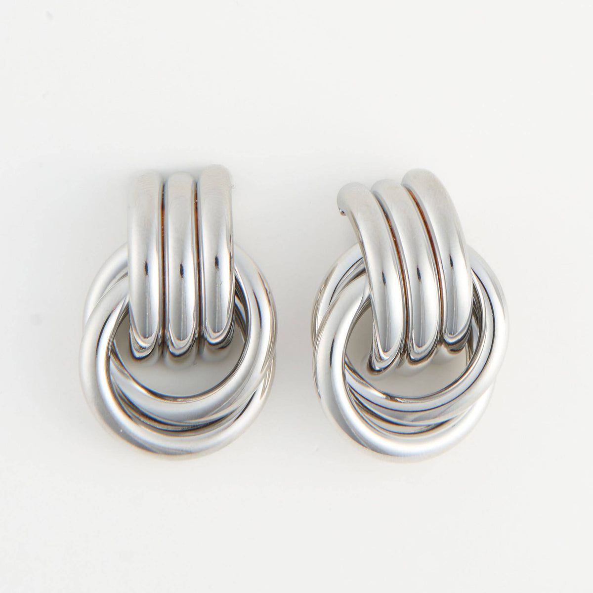 Howard's Solara interlocking triple knot stud earrings in silver, featuring a sleek, modern design with polished finish.