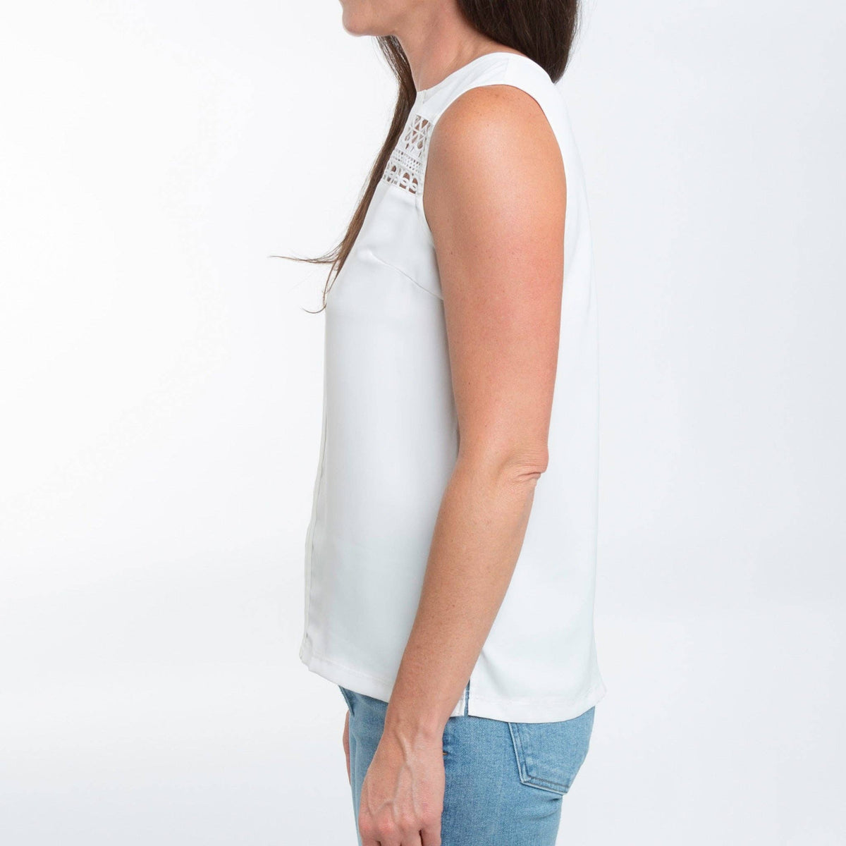 Howard's indie sleeveless white tank top with V-neck, casual blouse perfect for warm weather and layered outfits.