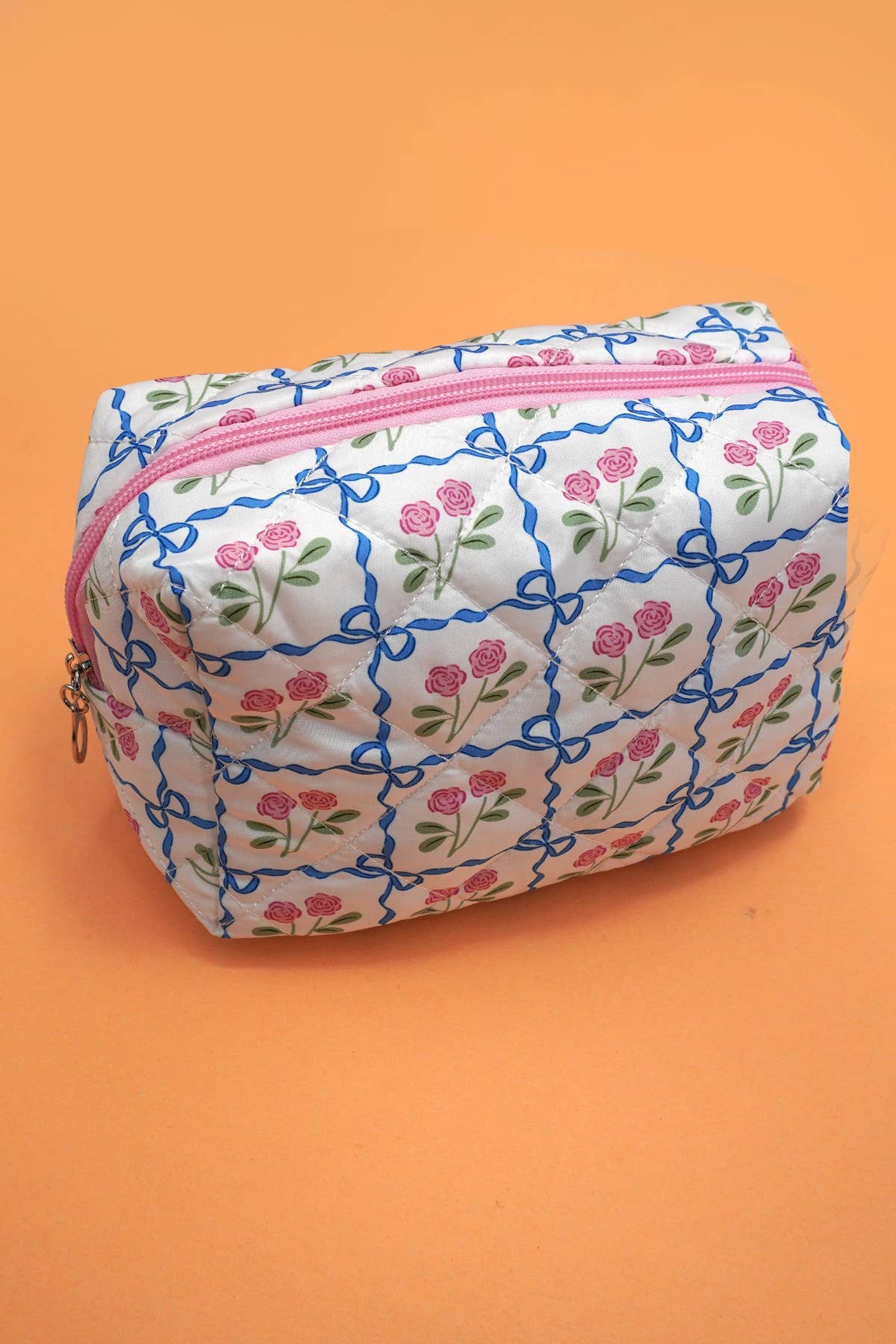 JOSSLYN floral toile pattern makeup cosmetic pouch bag with zipper closure, featuring colorful floral designs on fabric.