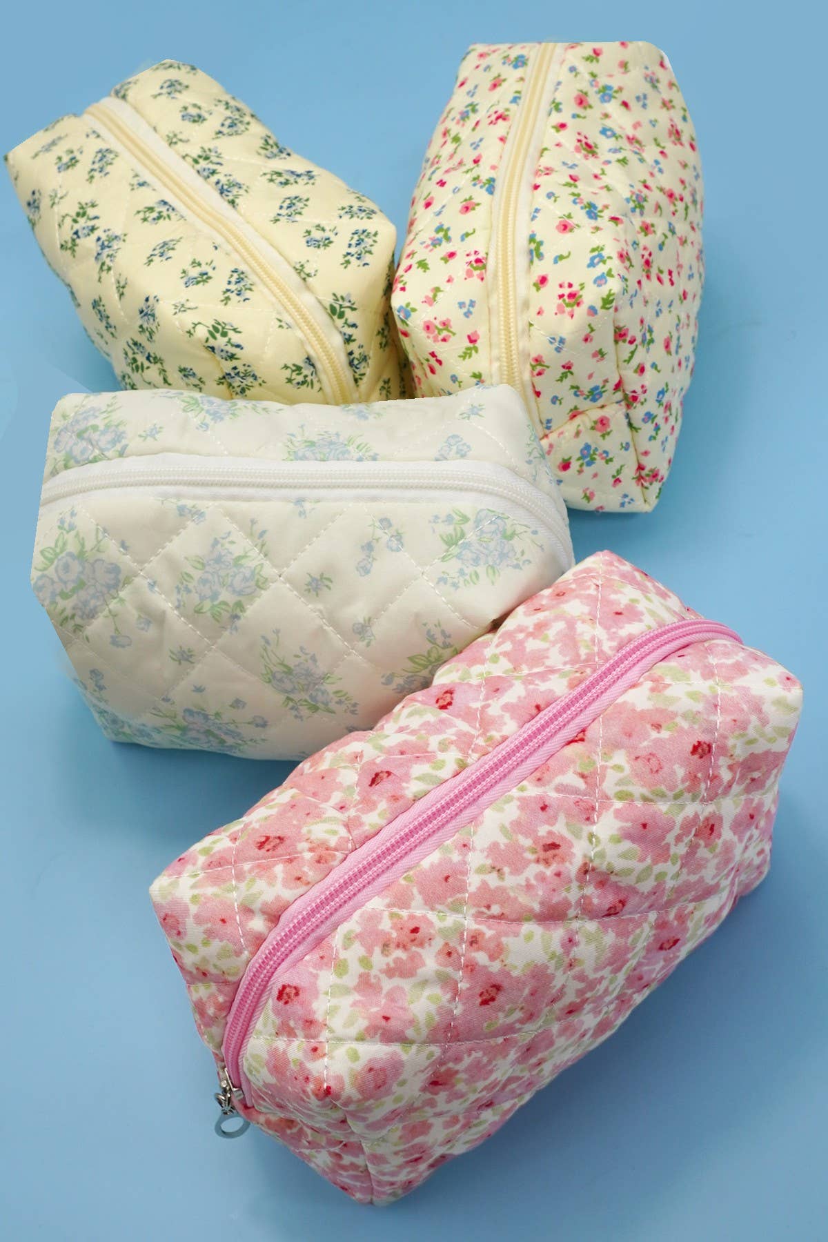JOSSLYN floral toile pattern makeup cosmetic pouch bag with zipper closure, featuring vibrant floral print and compact design.