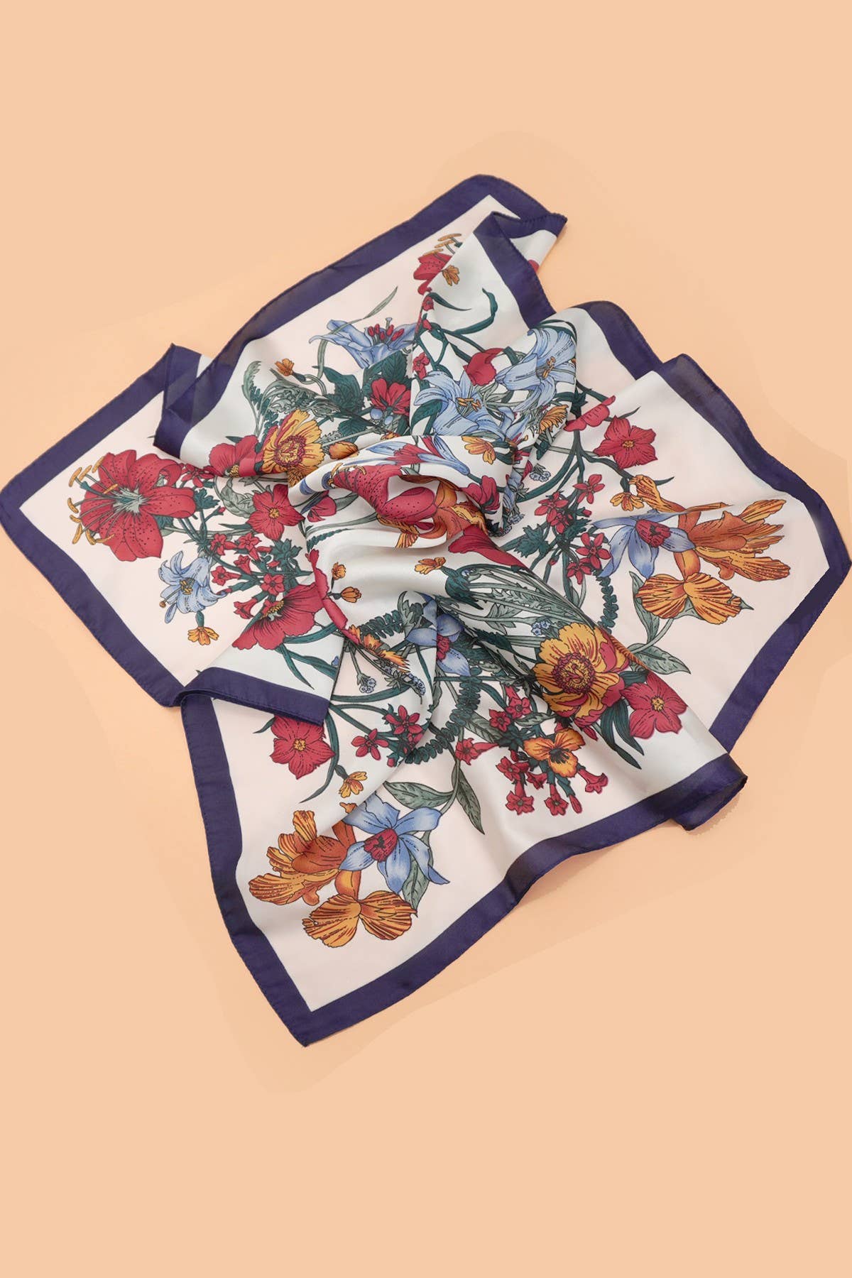 Large floral print bandana scarf by JOSSLYN featuring vibrant, colorful floral patterns on lightweight fabric.