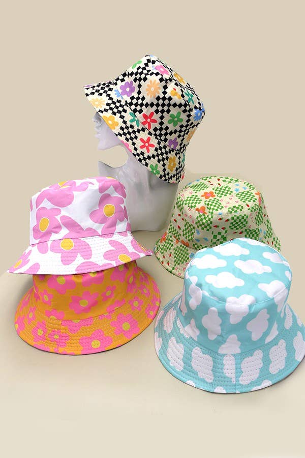 JOSSLYN floral bucket hat with colorful flower pattern, wide brim, perfect for sunny outdoor wear.