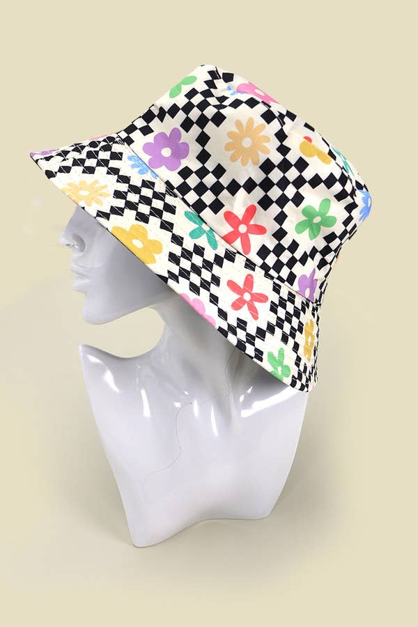 JOSSLYN floral bucket hat with colorful floral pattern, wide brim, and casual style for sun protection and fashion.