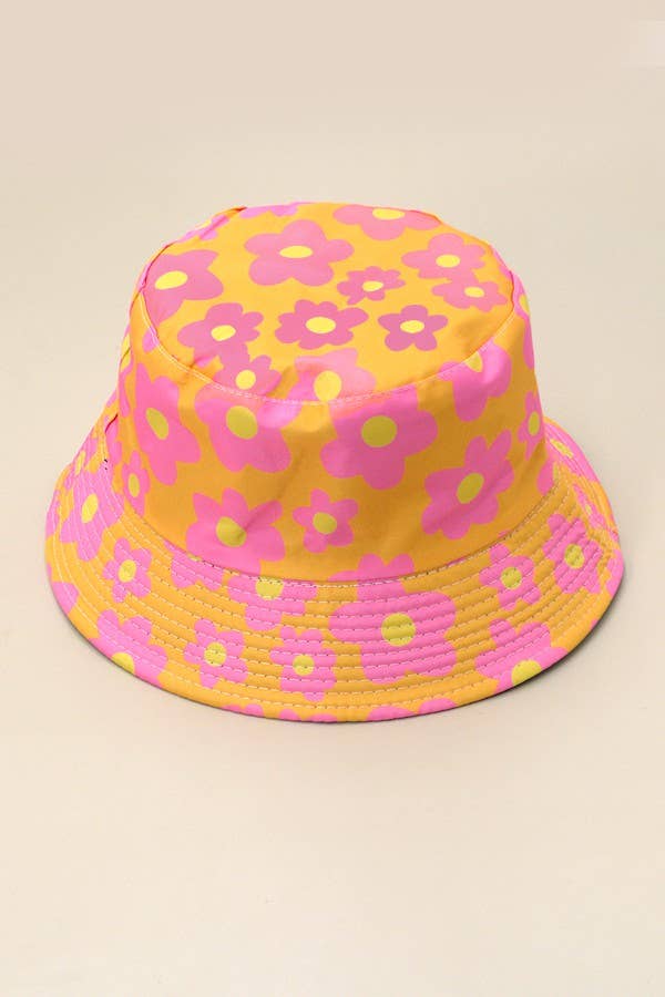 JOSSLYN floral bucket hat with colorful floral pattern, wide brim, and casual style, ideal for sunny weather.