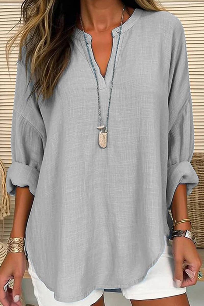 Lily Clothing V-neck cotton and linen breathable fashion shirt displayed flat, showcasing its soft fabric and stylish design.