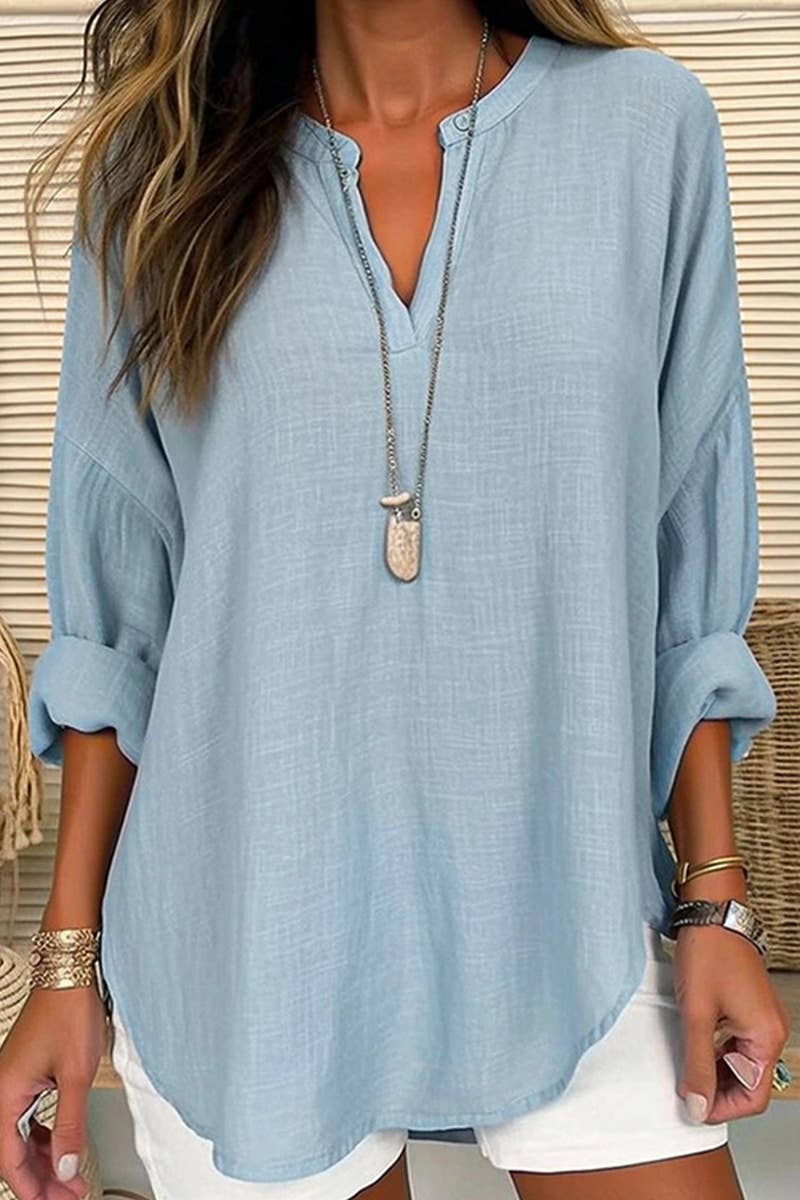 Lily Clothing V-neck cotton and linen breathable fashion shirt displayed on a hanger, showcasing lightweight, natural fabric.