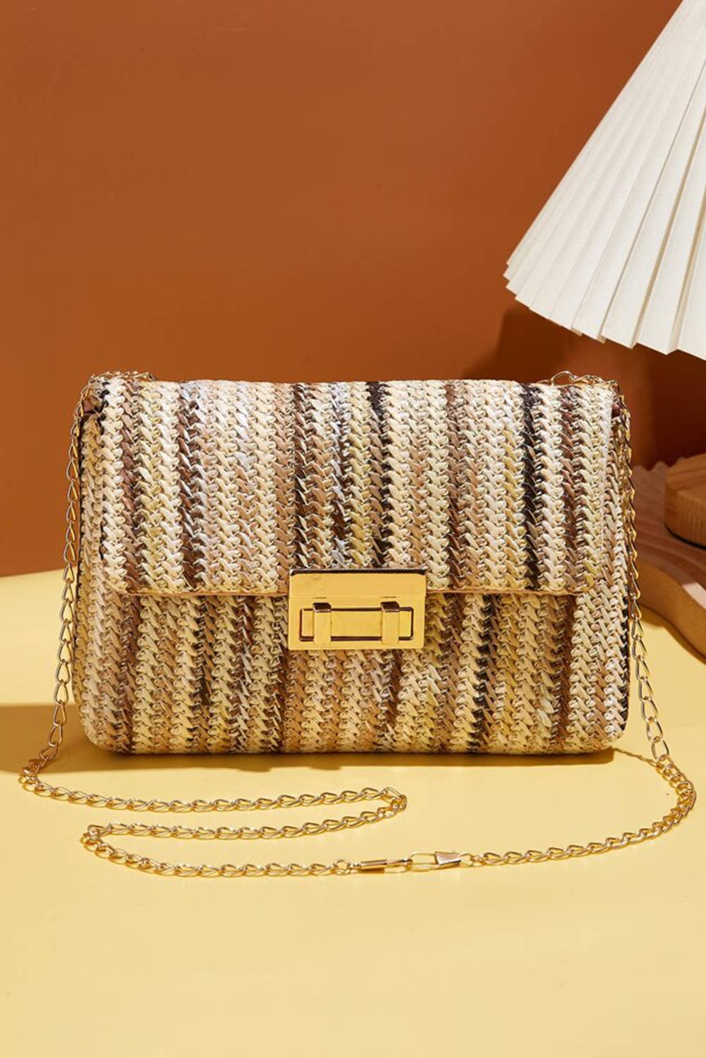 Bohemian woven gold chain shoulder bag by Little Daisy Closet with intricate woven design and stylish shoulder strap.