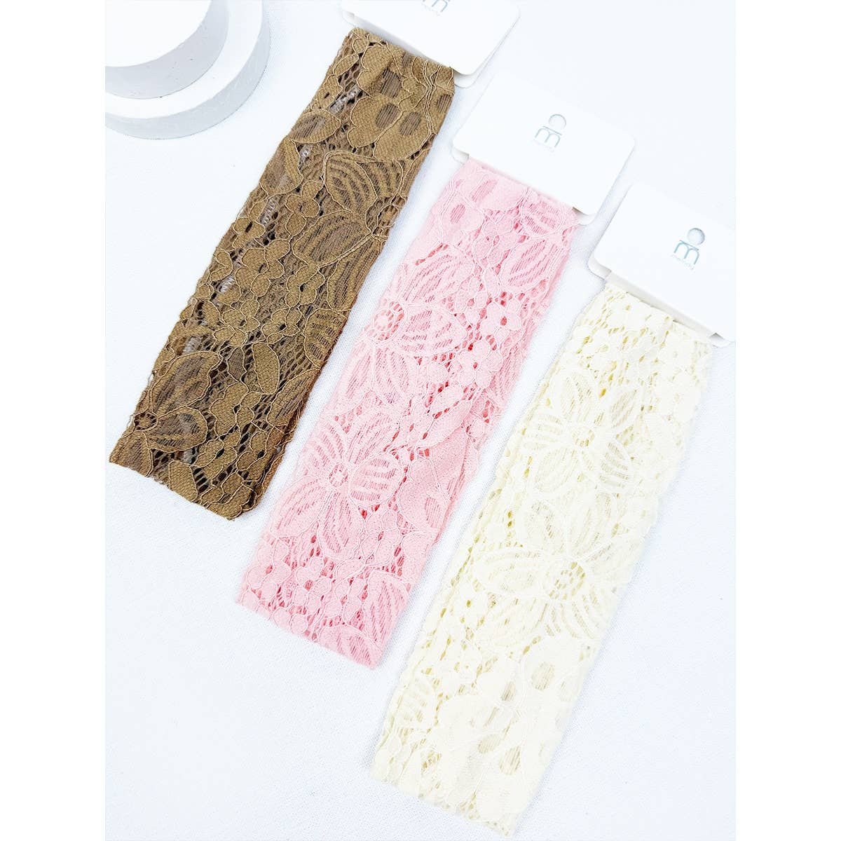 Stretch lace headwrap by Love and Repeat, soft and stretchy hair accessory with intricate lace design for versatile styling.