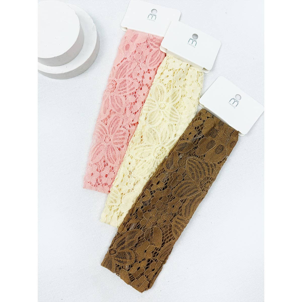 Love and Repeat stretch lace headwrap, a stylish hair accessory featuring a soft, stretchy lace design with a comfortable fit.