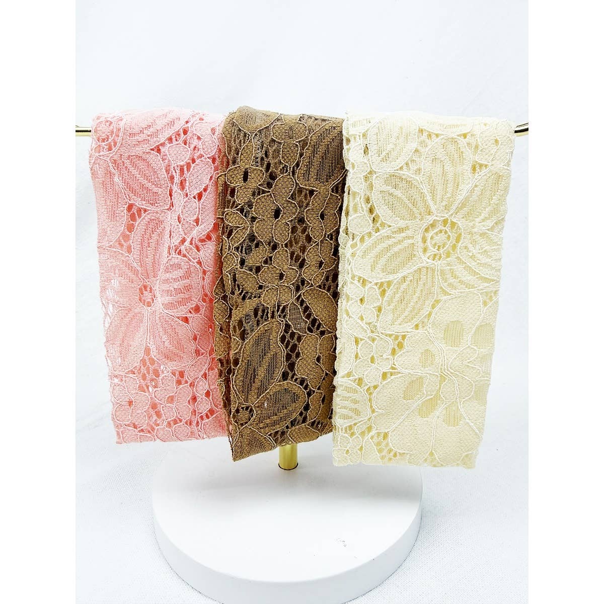 Love and Repeat stretch lace headwrap, a stylish hair accessory featuring a soft, elastic lace design for a comfortable fit.