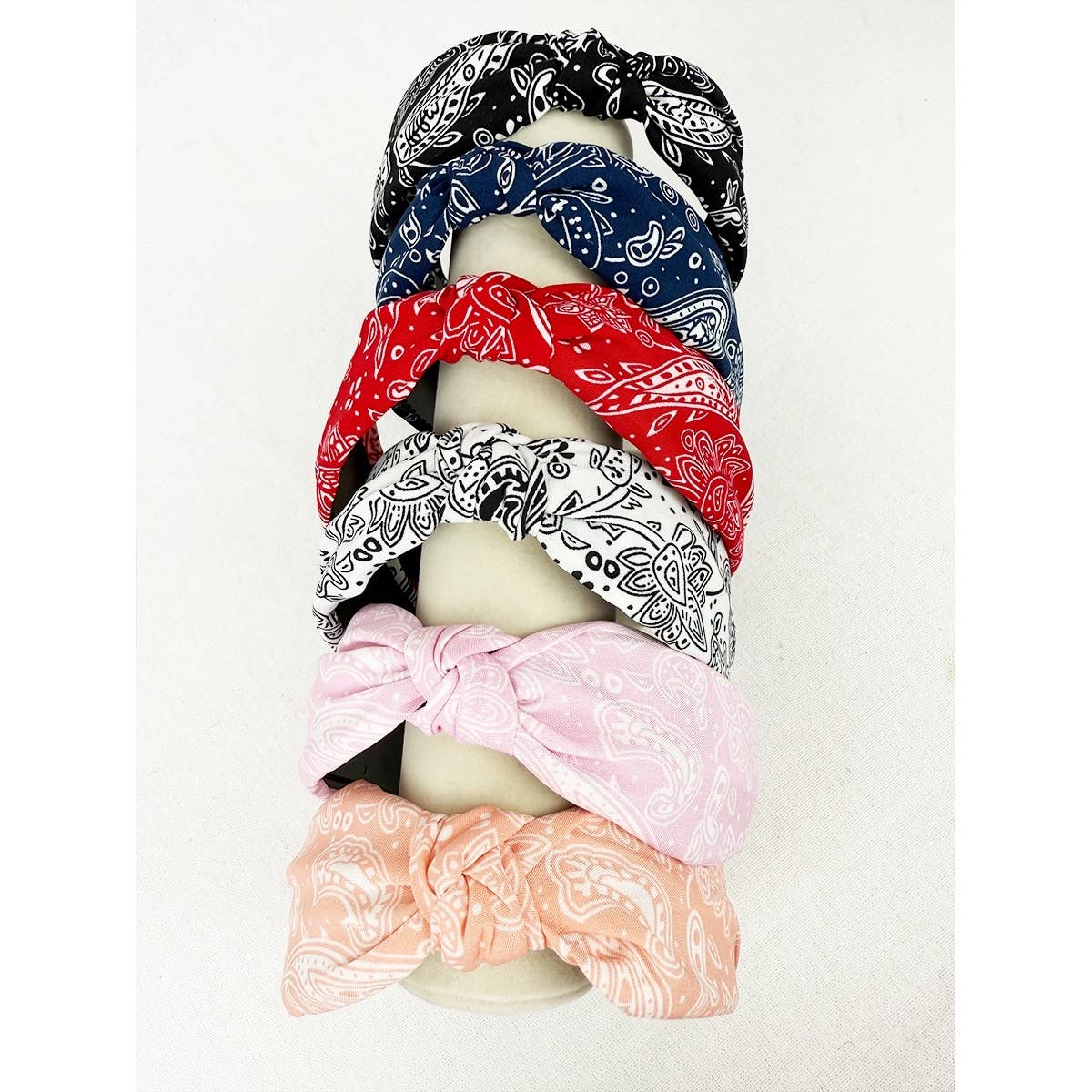 Love and Repeat bandana knot hairband with a stylish printed design, ideal for casual or trendy hair accessory looks.
