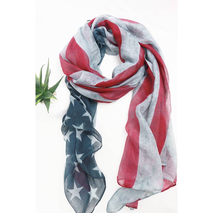 Love and Repeat American flag oblong scarf featuring red, white, and blue stars and stripes, draped fabric display.