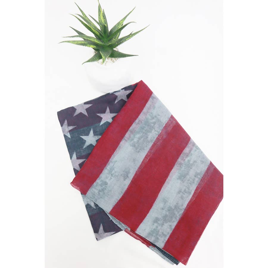 American Flag oblong scarf by Love and Repeat featuring a patriotic design with red, white, and blue stars and stripes.