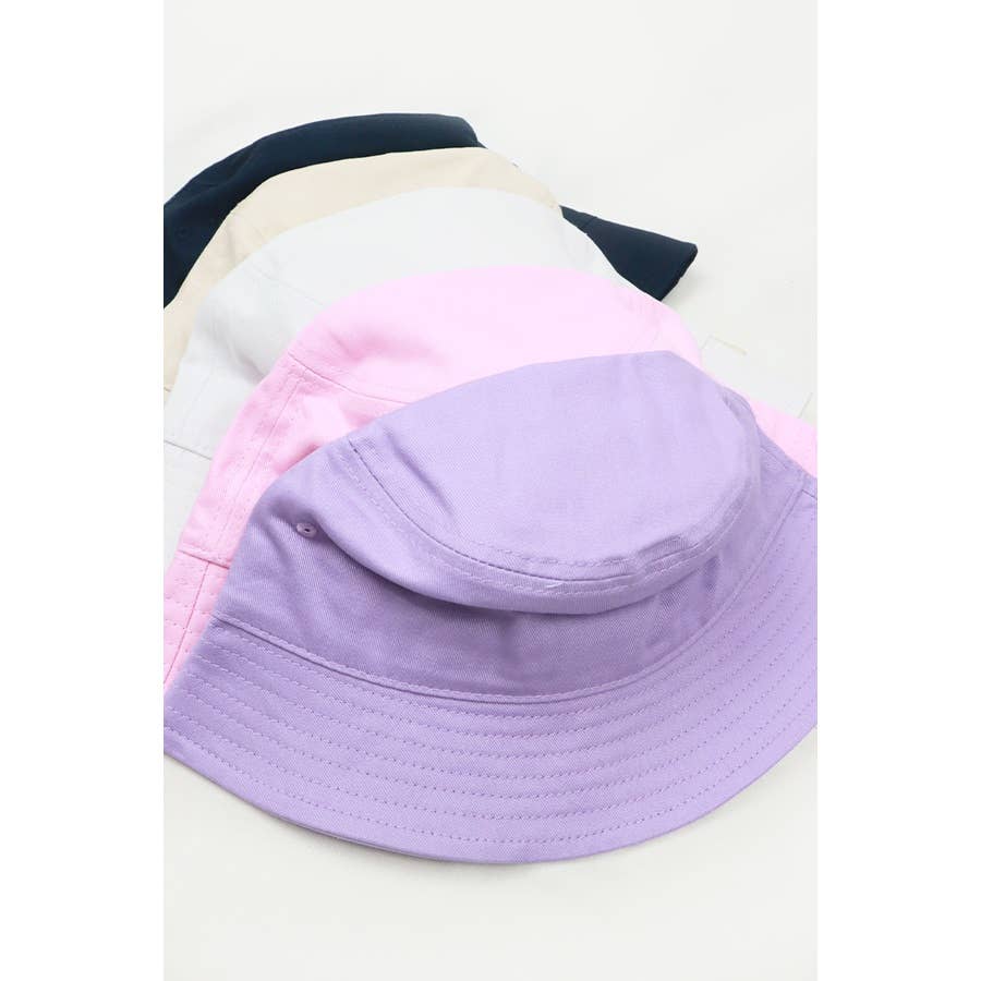 Love and Repeat hot summer bucket hat with wide brim and colorful pattern, perfect for sun protection and casual style.