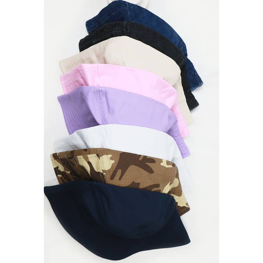 Love and Repeat hot summer bucket hat in lightweight fabric with wide brim, ideal for sun protection and casual outdoor wear.