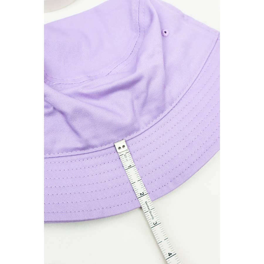 Love and Repeat hot summer bucket hat with wide brim and vibrant design, perfect for sun protection and casual outdoor wear.