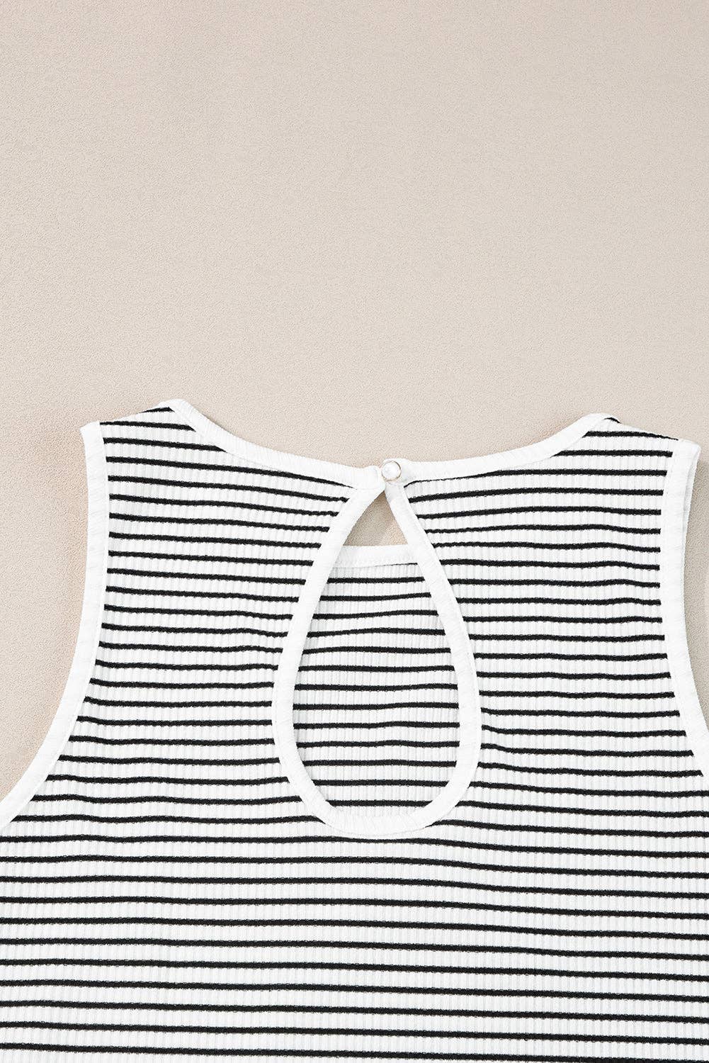 Black striped tank top by Lovesoft, sleeveless design with vertical stripes, casual summer fashion, front view.