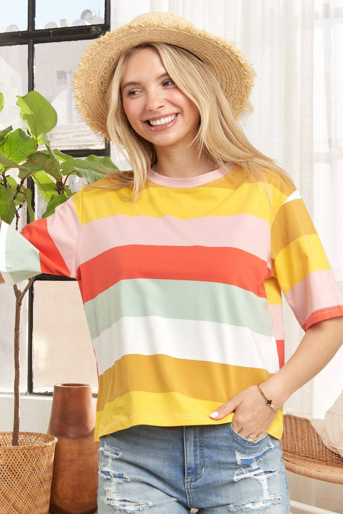 Madelyn multi-color stripe cotton top featuring a stylish, casual design with vibrant horizontal stripes and a comfortable fit.