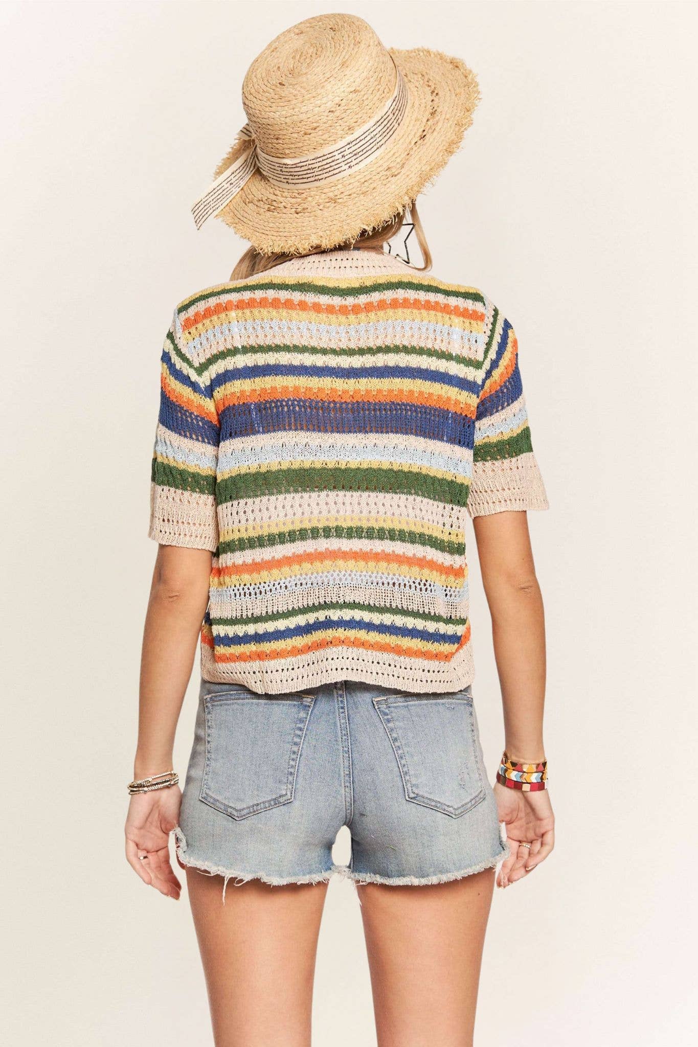 Multicolor sweater top by Madelyn featuring a cozy knit fabric and vibrant pattern, ideal for casual and stylish outfits.