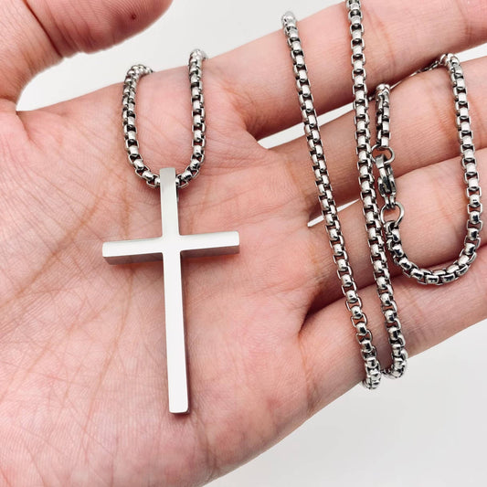 Glossy cross stainless steel pendant necklace by Mio Queena with a sleek steel finish, featuring a modern cross design.