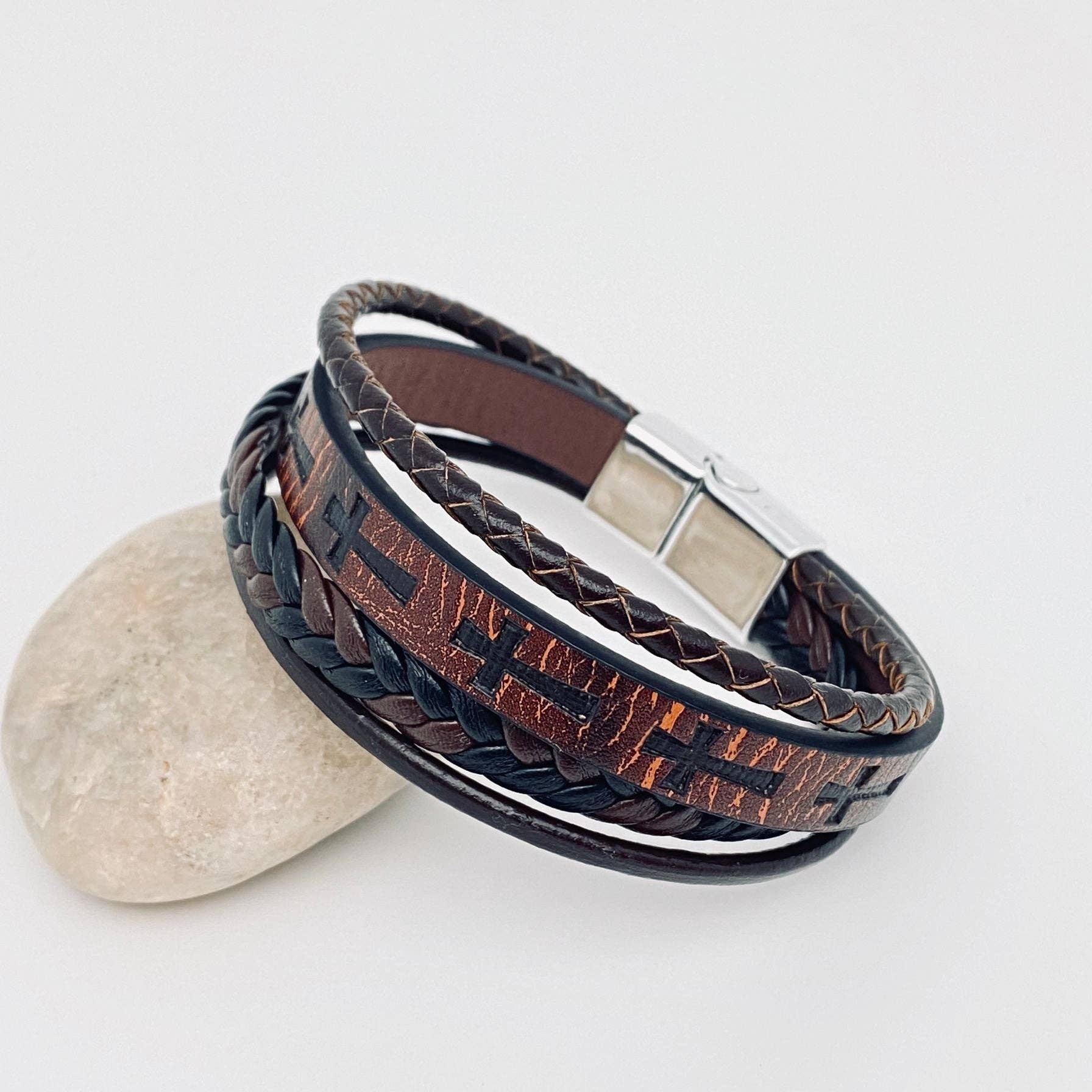 Handmade leather cross men's bracelet with magnetic buckle by Mio Queena, featuring a 7.48-inch adjustable strap.