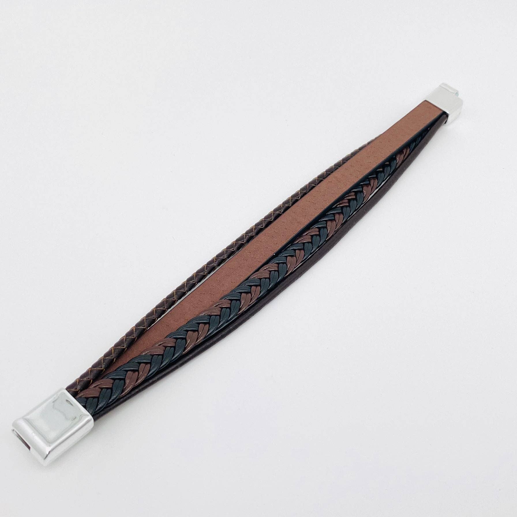 Handmade leather men's bracelet with magnetic buckle, featuring a cross design and adjustable length, by Mio Queena.