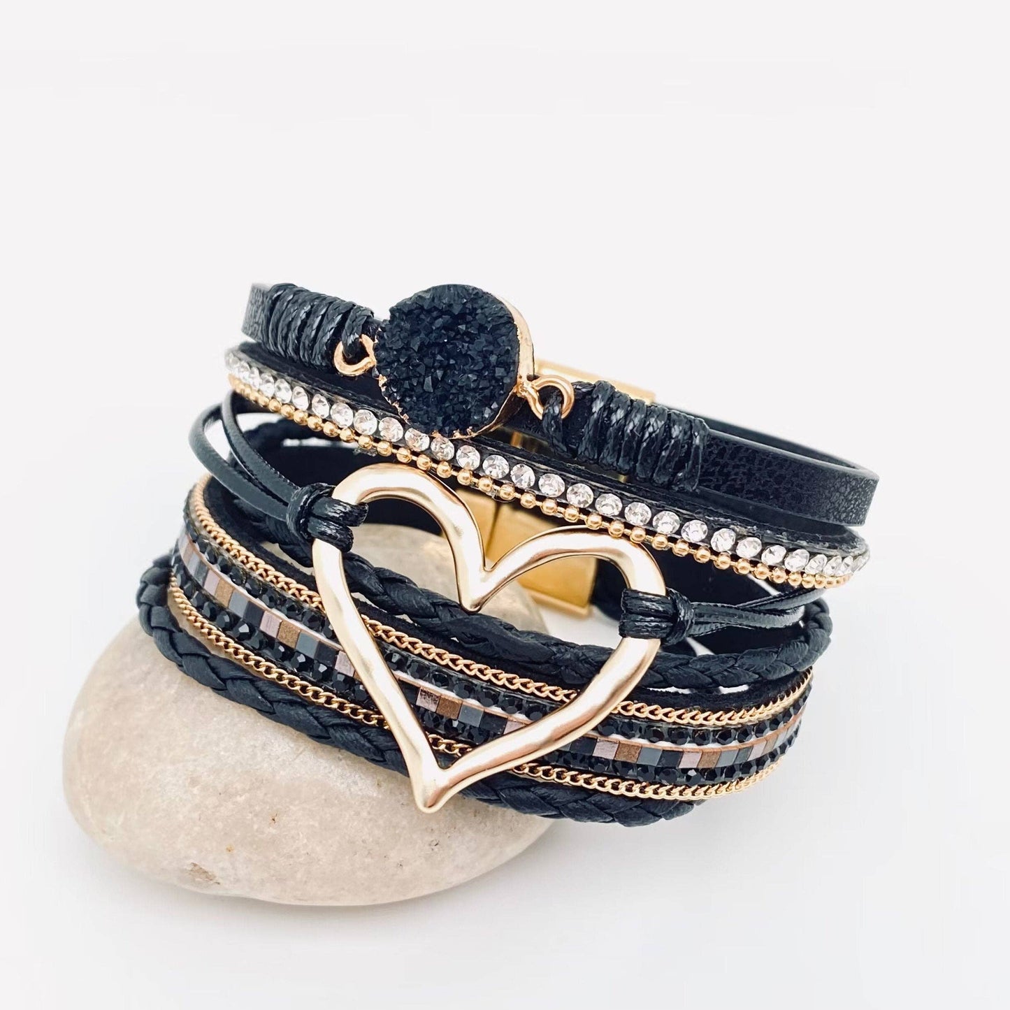 Silver multi-layer heart charm bangle bracelet by Mio Queena, featuring layered heart designs and adjustable fit.