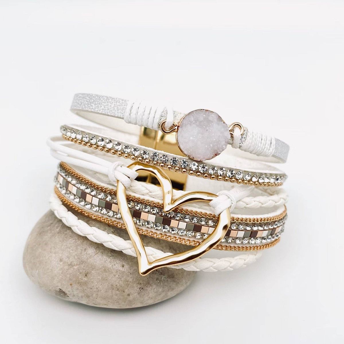 Silver multi-layer heart charm bangle bracelet by Mio Queena featuring layered design and intricate heart charms on a sleek silver band.