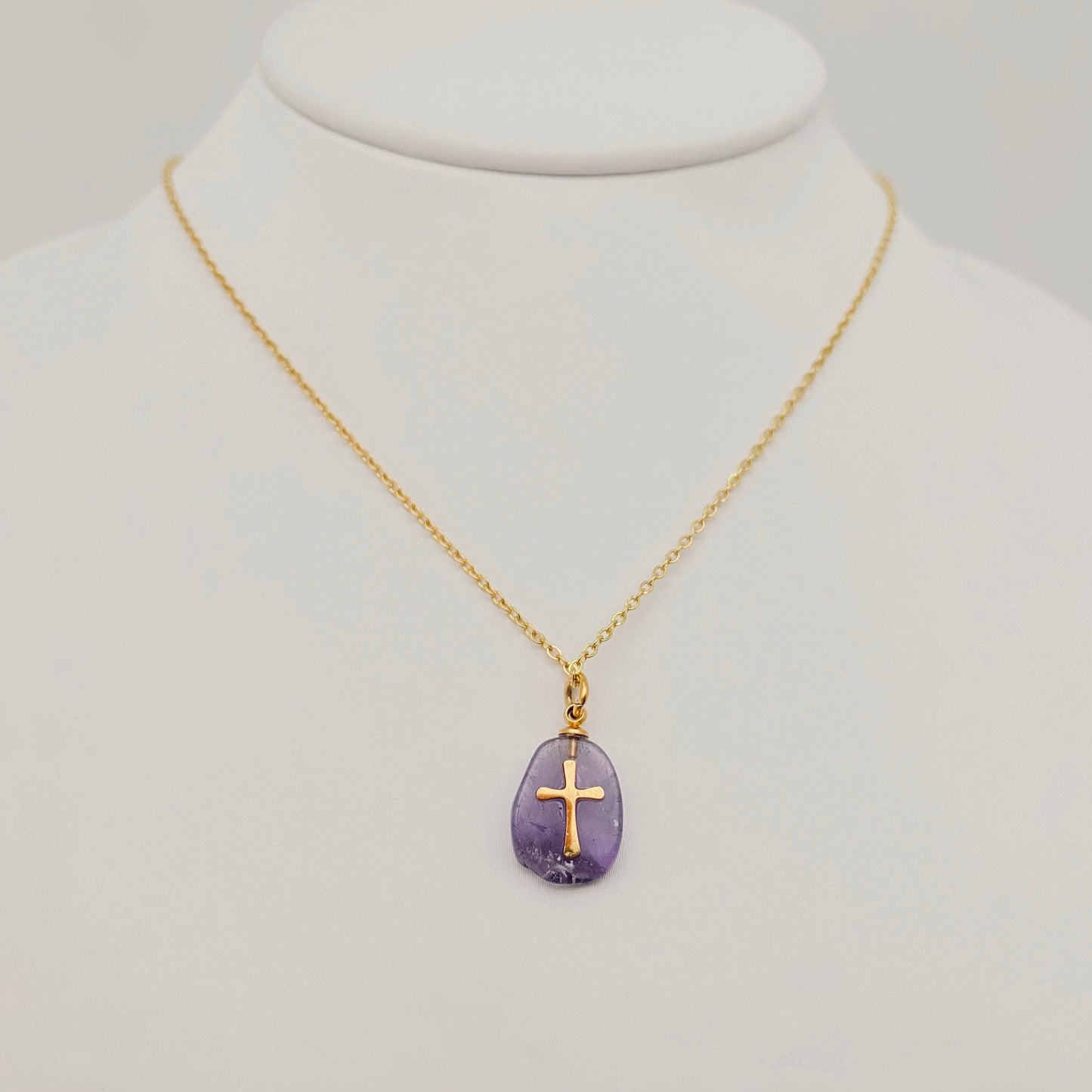 Natural stone stainless steel cross pendant necklace by Mio Queena featuring a white cross design and sleek silver finish.