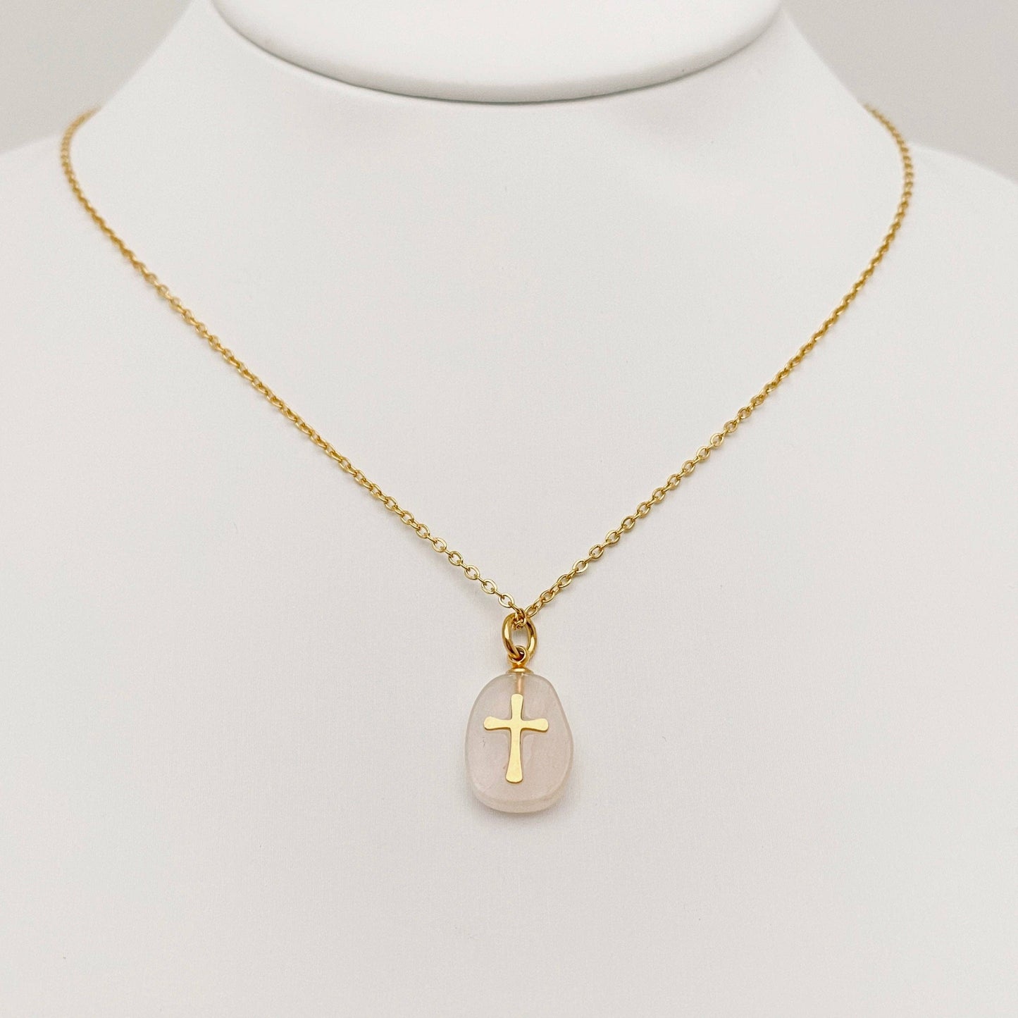 Turquoise blue natural stone stainless steel cross pendant necklace by Mio Queena, featuring a detailed cross design on a sleek chain.