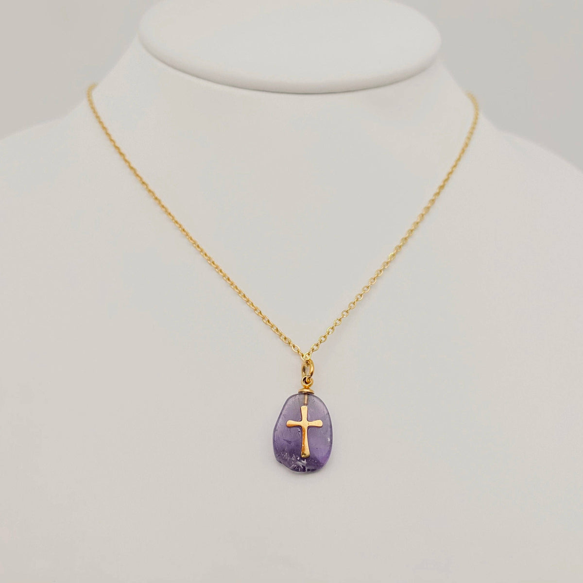 Natural green stone stainless steel cross pendant necklace by Mio Queena, featuring a polished cross design with a green stone accent.