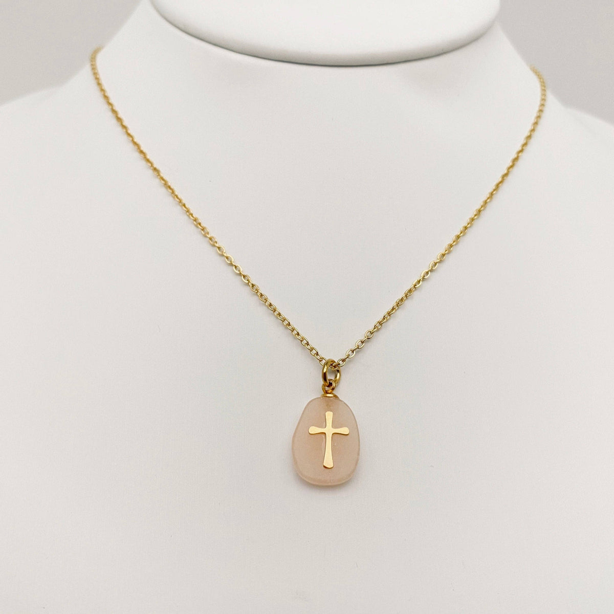 Gray natural stone stainless steel cross pendant necklace by Mio Queena, featuring a sleek, polished cross design.