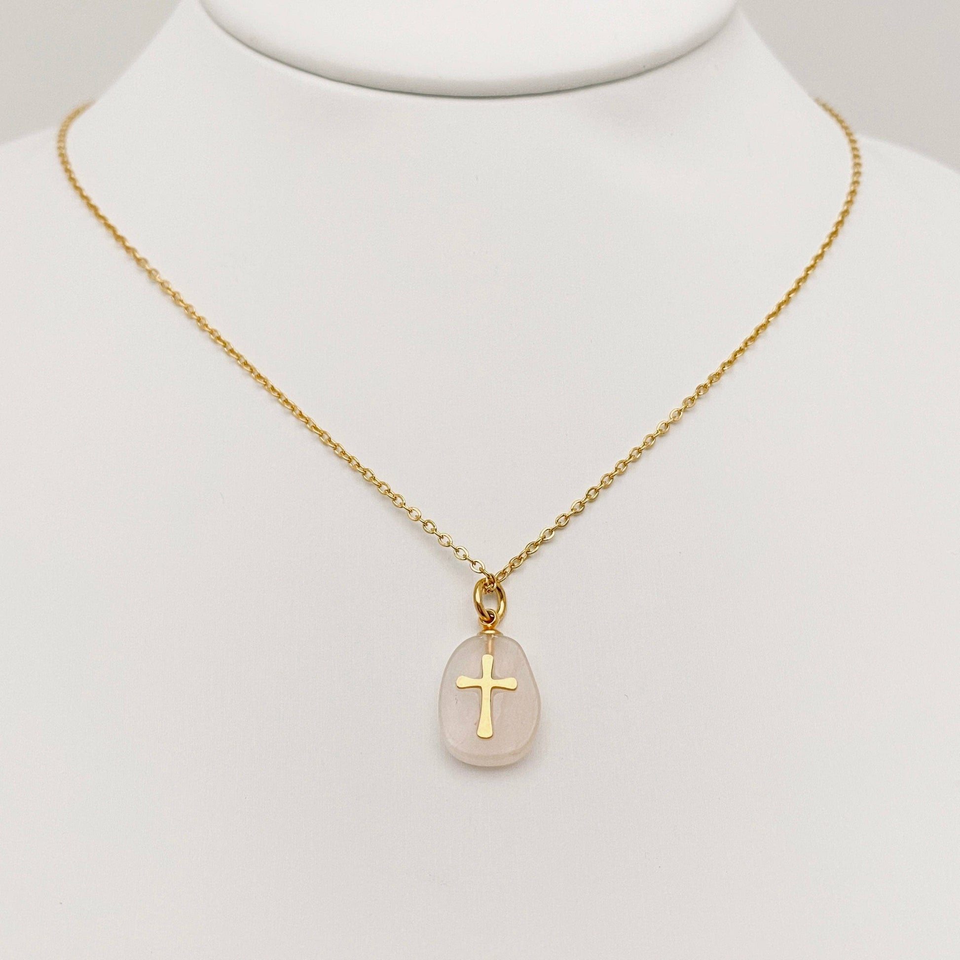 Natural stone stainless steel cross pendant necklace by Mio Queena featuring a gray cross on a sleek chain.