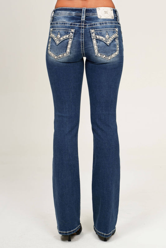 Miss Me 30 Mid Rise Boot Cut Jean in style M9517BS, showing the classic denim fabric and boot cut silhouette.
