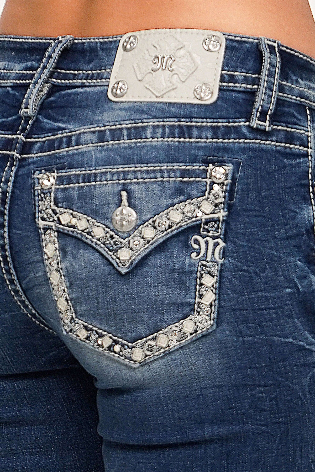 Miss Me 30 Mid Rise Boot Cut Jean in style M9517BS, showing the classic denim fabric and boot cut silhouette.