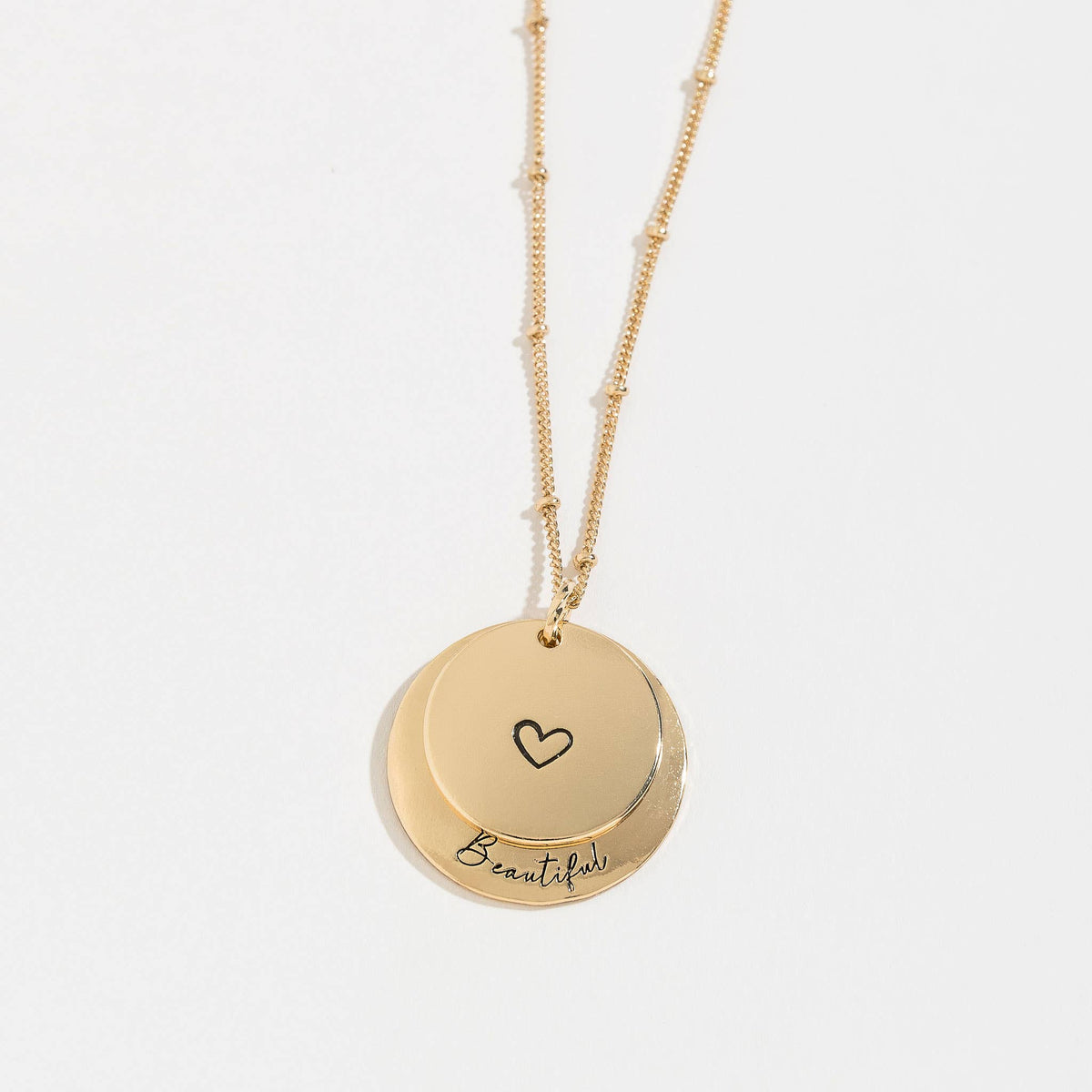 Hidden heart pendant necklace by My Store featuring a delicate chain and a concealed heart charm on a sleek silver finish.