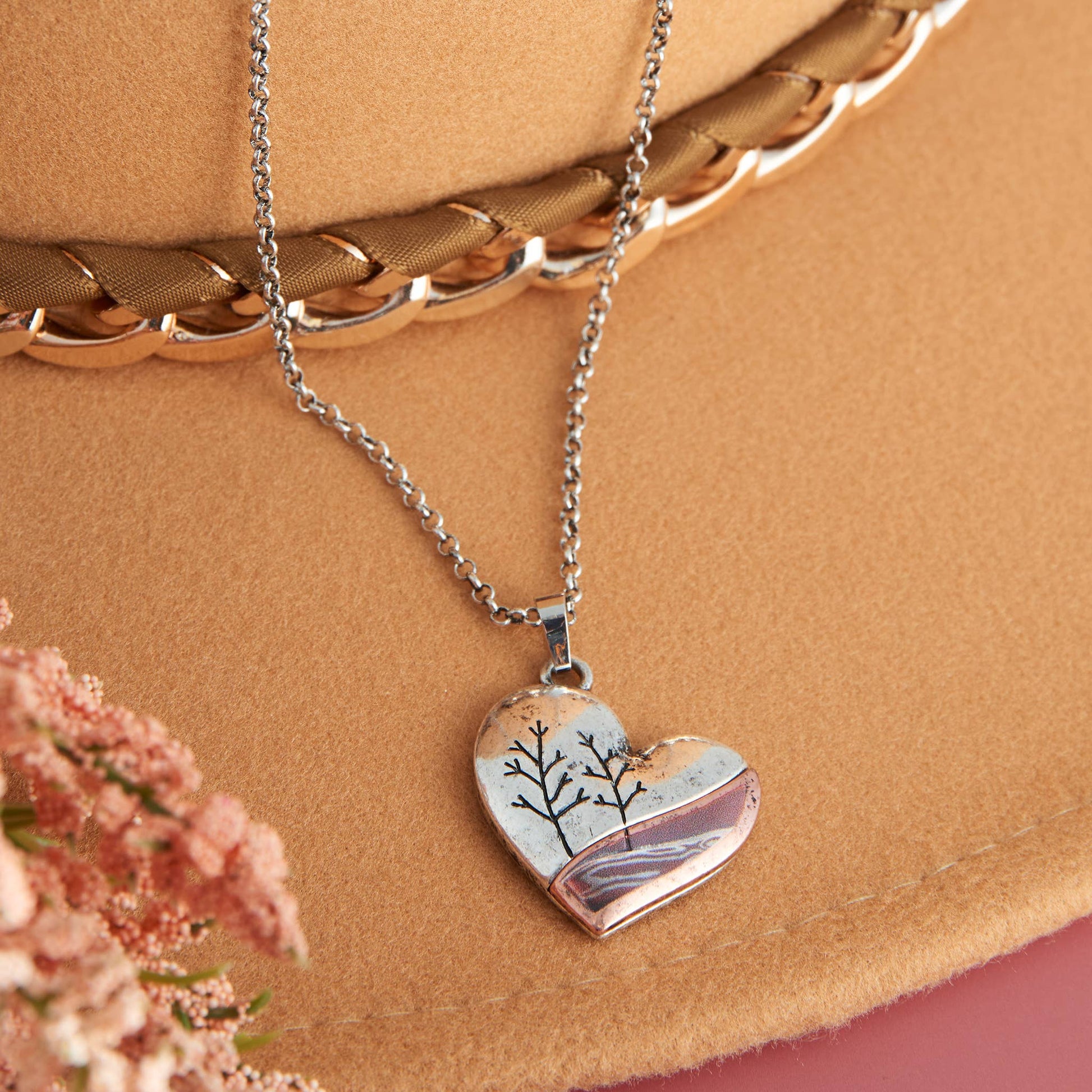 Kelso Nature Heart 16-inch pendant necklace featuring a detailed nature-inspired heart design on a silver chain.
