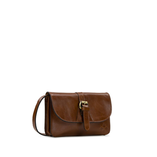 Patricia Nash Torri Crossbody bag in vintage distressed cognac leather with adjustable strap and gold-tone hardware.