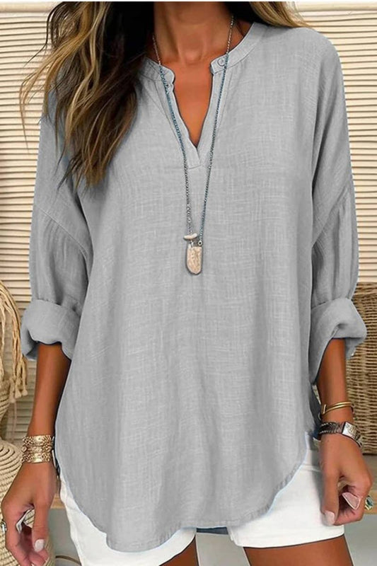 Ninexis linen long sleeve blouse with V-neck, casual style, in soft fabric, shown on a model.